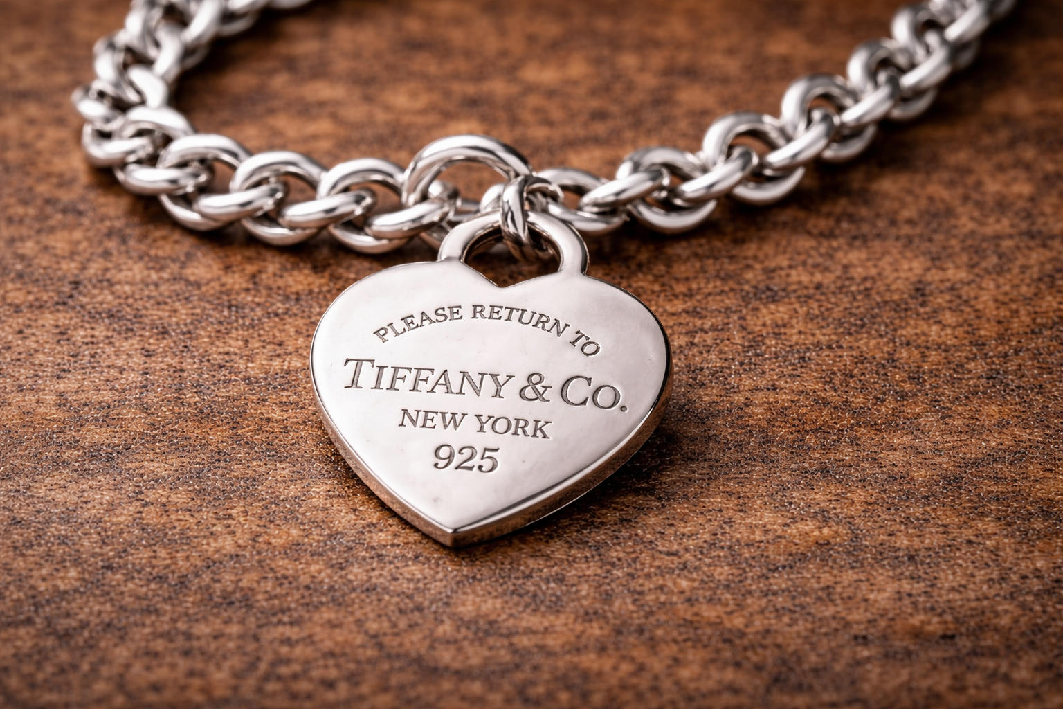Sterling silver bracelet with maker’s mark and brand engraving used to identify jewelry origin